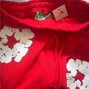 Denim Tears Red Cotton Sweatpants with White Wreath Print